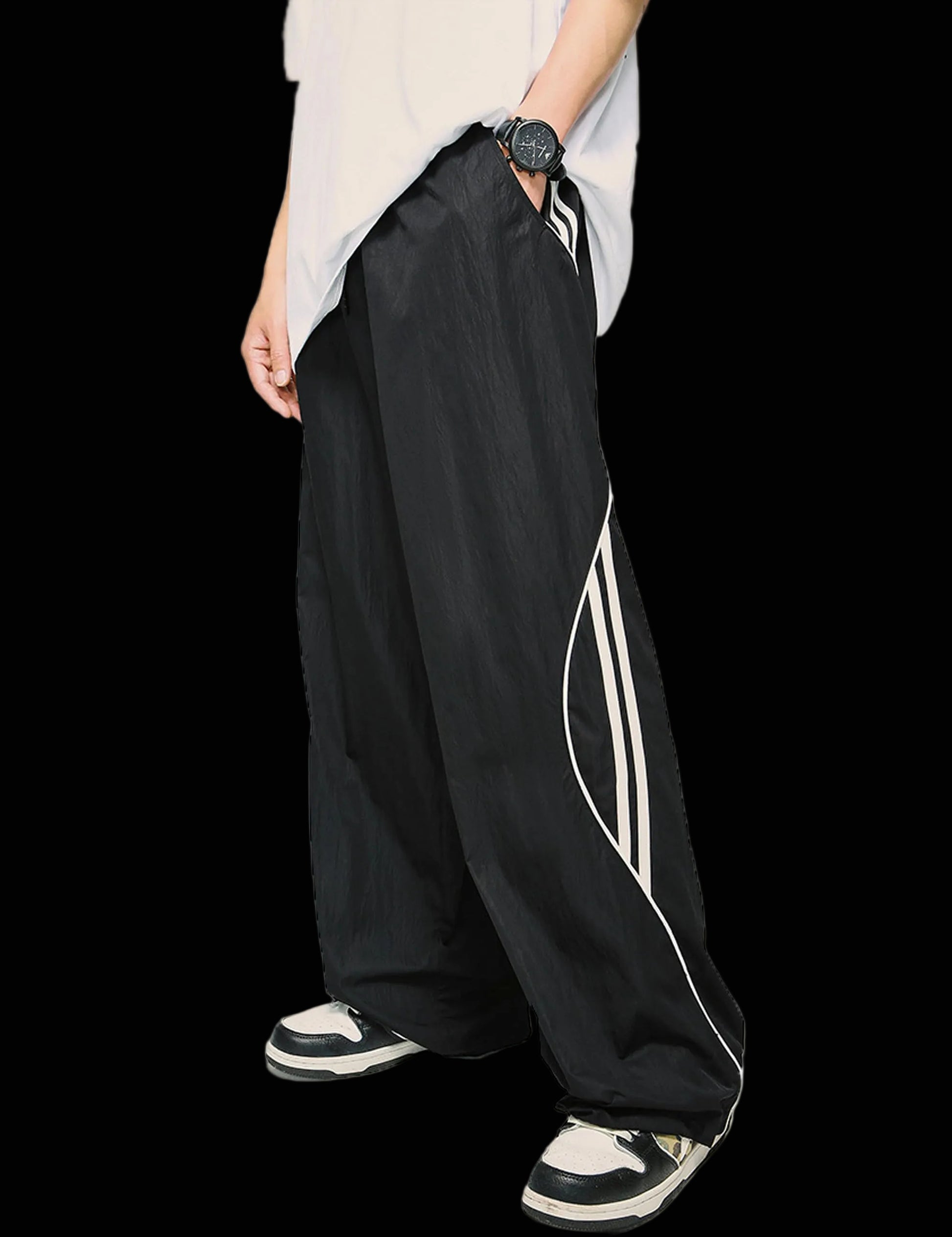 Black wide-leg pants with white stripes worn by a person on a white background